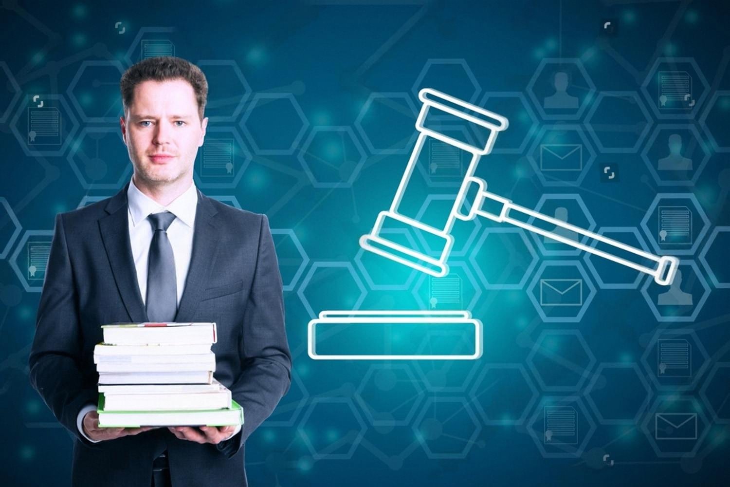 Law student in a suit holding stacked textbooks with a gavel graphic in the background